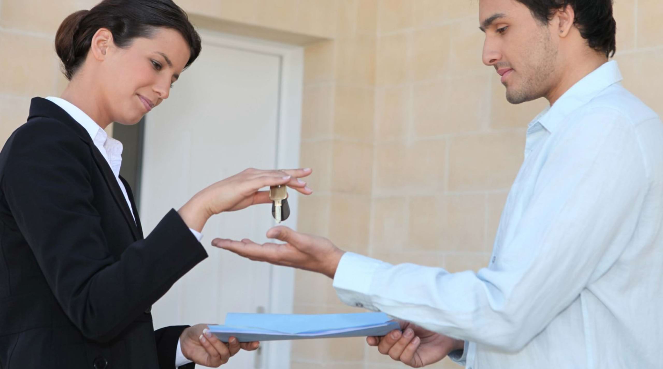 Agent delivering an apartment key